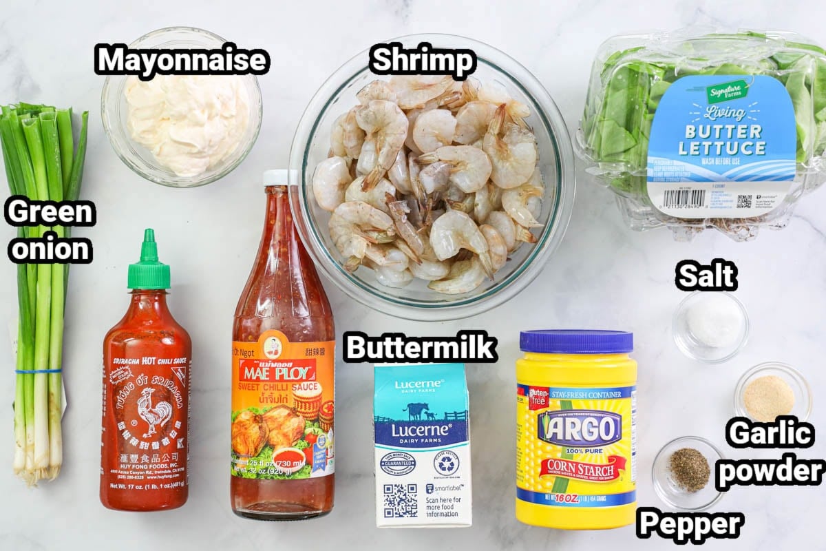 Ingredients for Bang Bang Shrimp: shrimp, mayonnaise, Sriracha, sweet chili sauce, green onions, buttermilk, corn starch, salt, pepper, garlic powder, and butter lettuce.