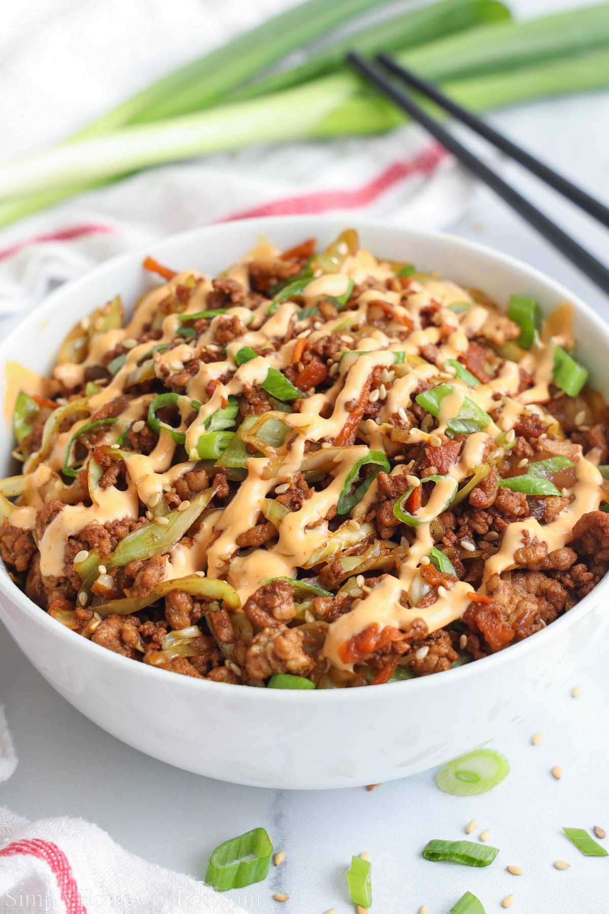 Egg Roll in a Bowl drizzled with spicy mayo.