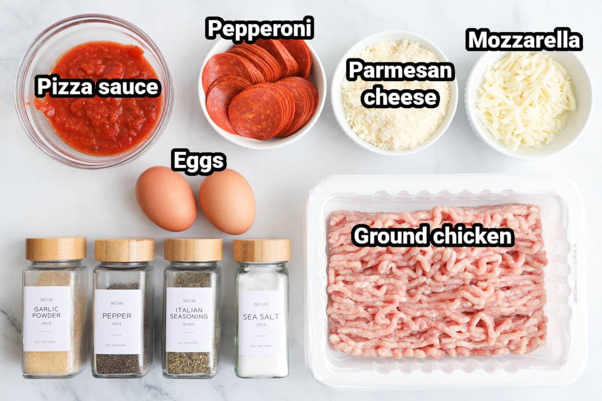 Ingredients for Chicken Crust Pizza: pizza sauce, pepperoni, parmesan cheese, mozzarella, eggs, ground chicken, garlic powder, pepper, sea salt, and italian seasoning.